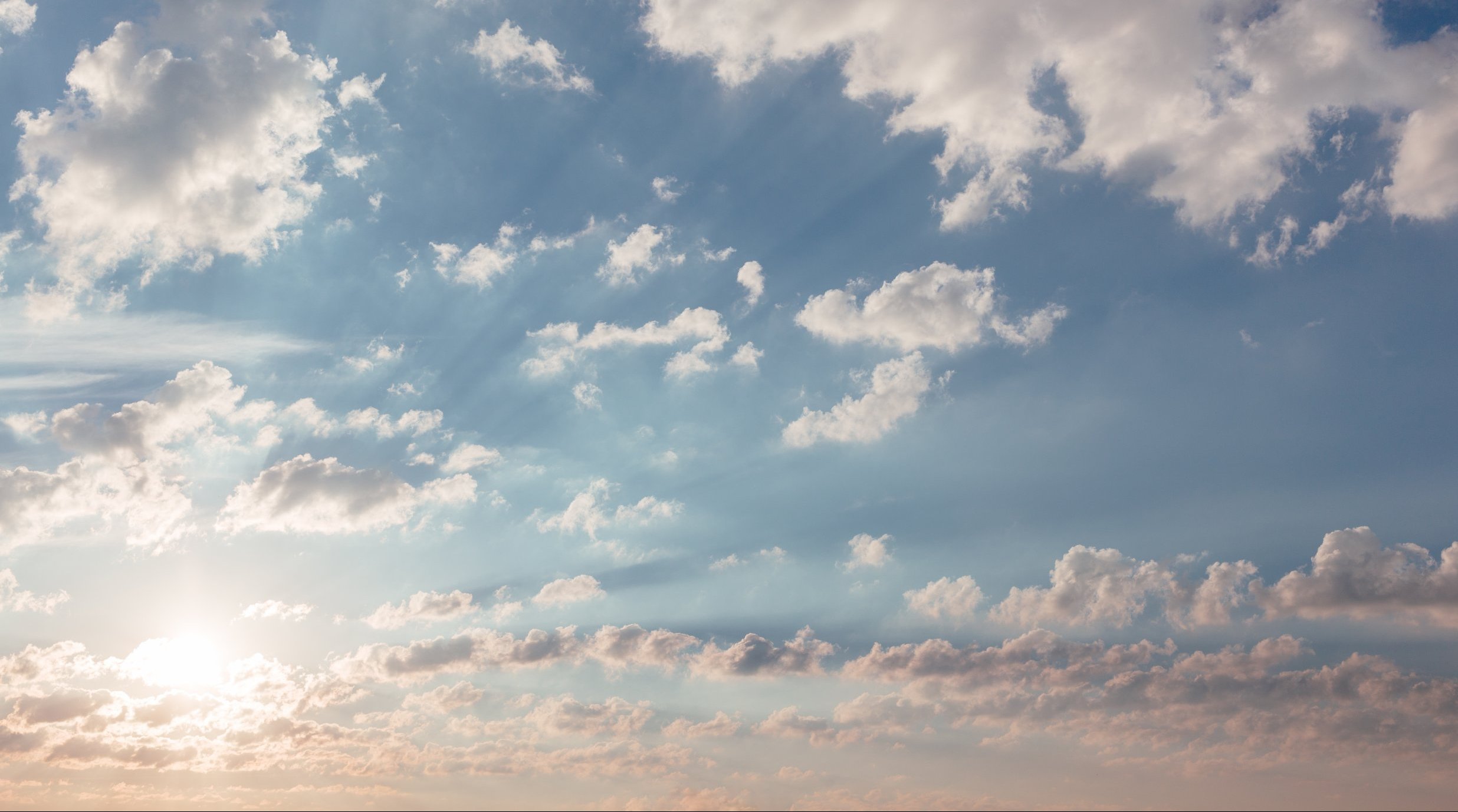 blue sky with sun clouds during the day